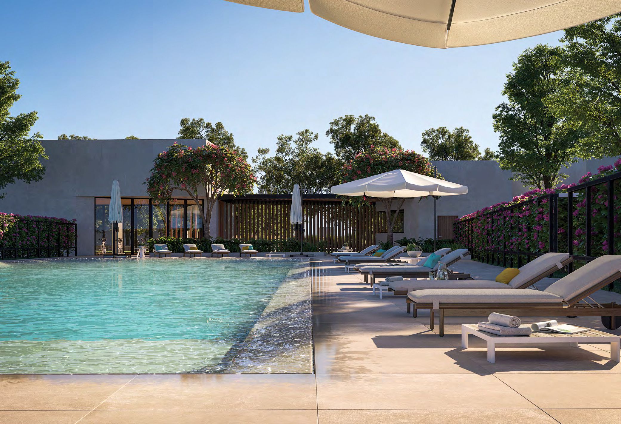Noya Yas Island family walking along tree-lined streets, stylish townhouse setting, Yas Island